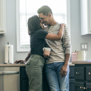 couple discussing home appraisal in kitchen