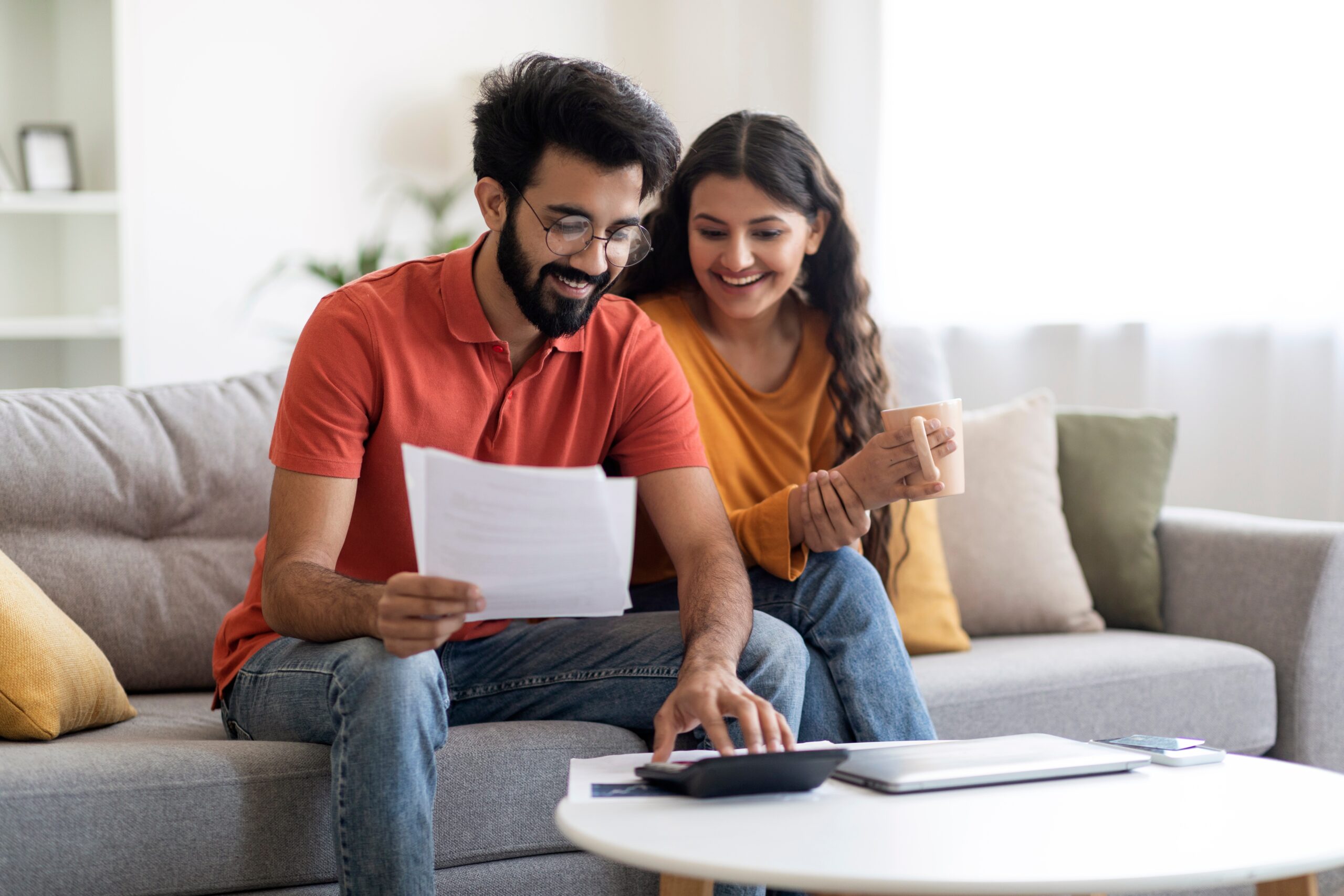 husband and wife consider refinancing options with little to no equity on their home